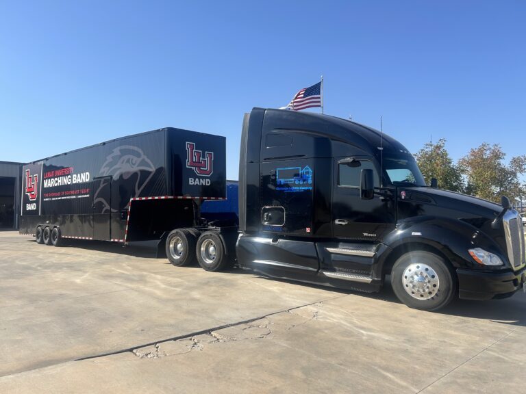 Kenworth T680 pulling tandem axle enclosed gooseneck trailer